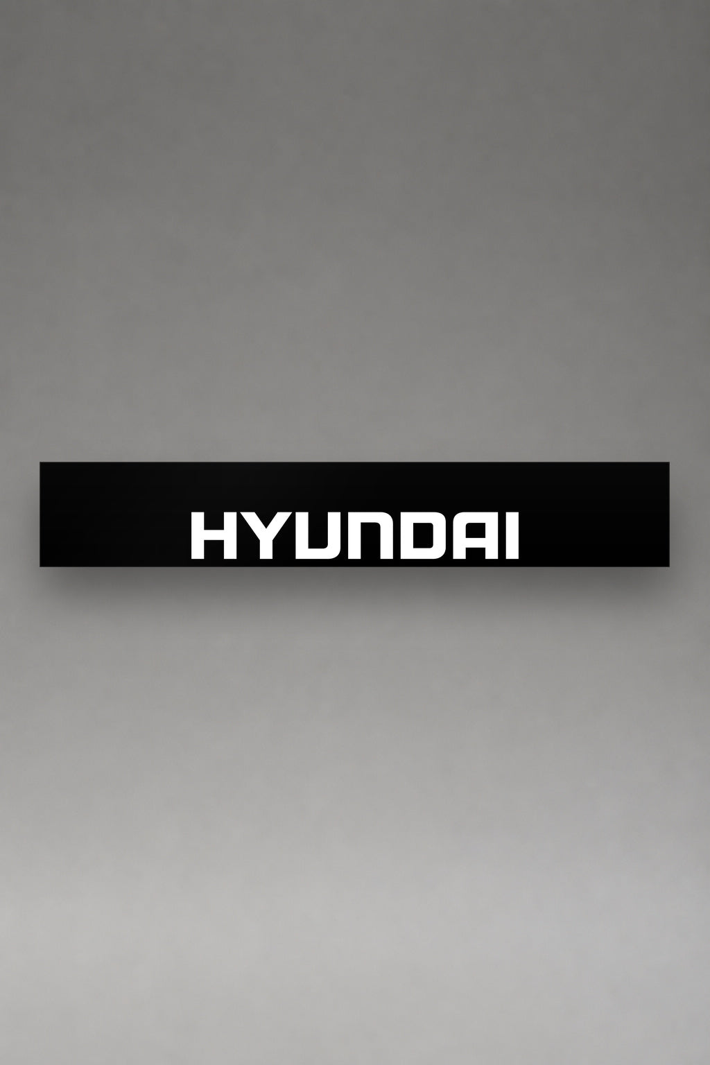 Parasol de vinilo Hyundai · Lettering Moderno Tipográfico, la tira entera de 150 x 25 cm vista de frente, de MOA-Grafics.
