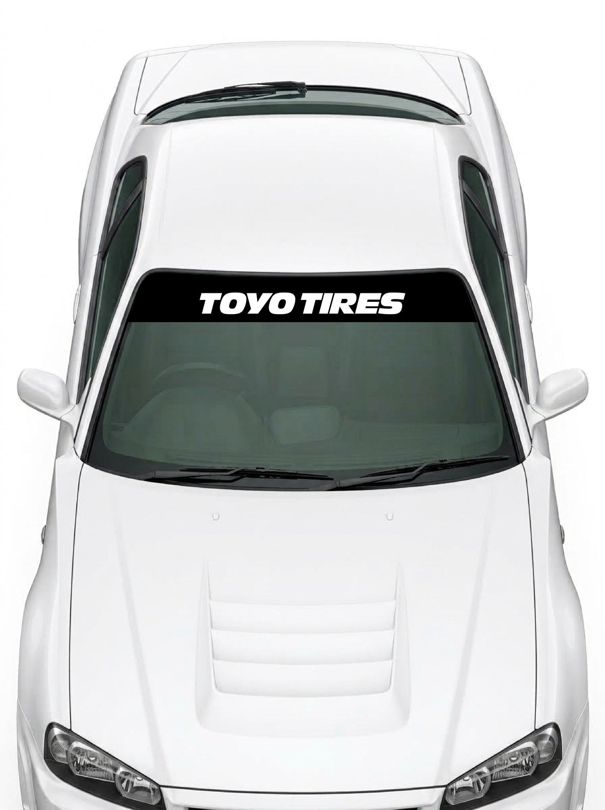 Coche con el parasol de vinilo Toyo Tires negro con el lettering TOYO TIRES en blanco instalado en el parabrisas
