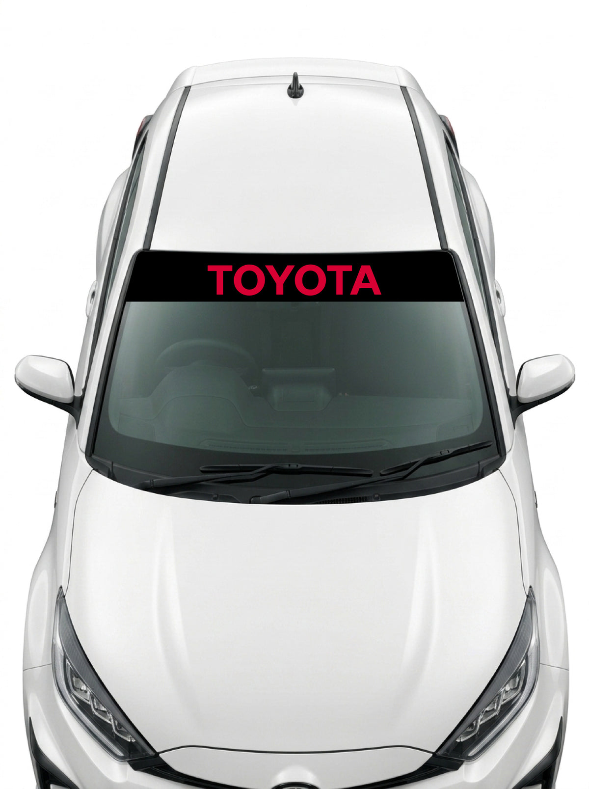 Coche con el parasol de vinilo Toyota negro con el lettering TOYOTA en rojo instalado en el parabrisas