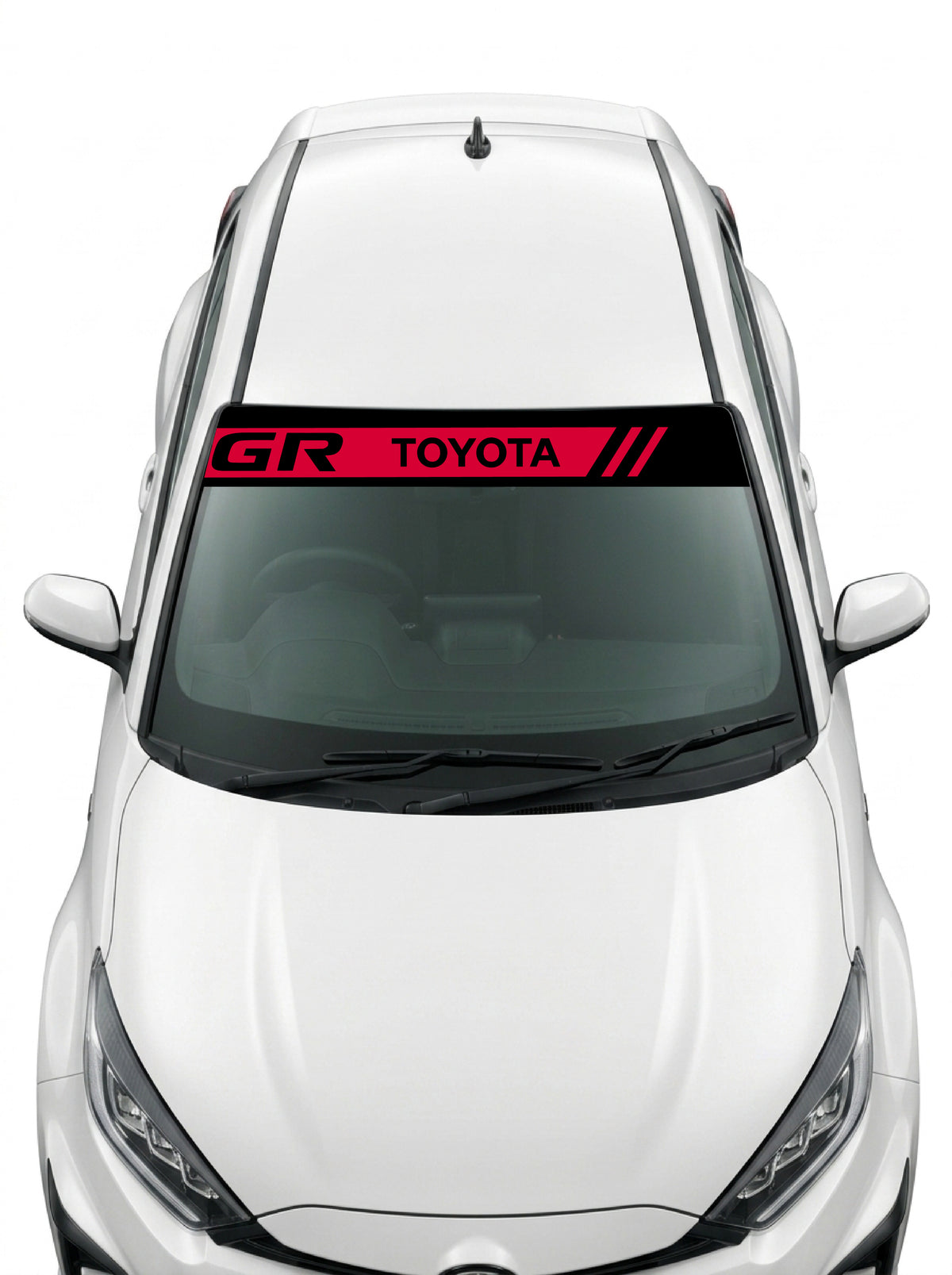 Coche con el parasol de vinilo Toyota negro con la banda roja, el lettering GR TOYOTA y las tres barras inclinadas instalado en el parabrisas