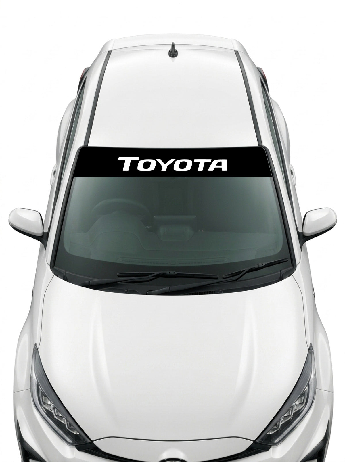 Coche con el parasol de vinilo Toyota negro con el lettering TOYOTA en blanco y tipografia italica estrecha instalado en el parabrisas