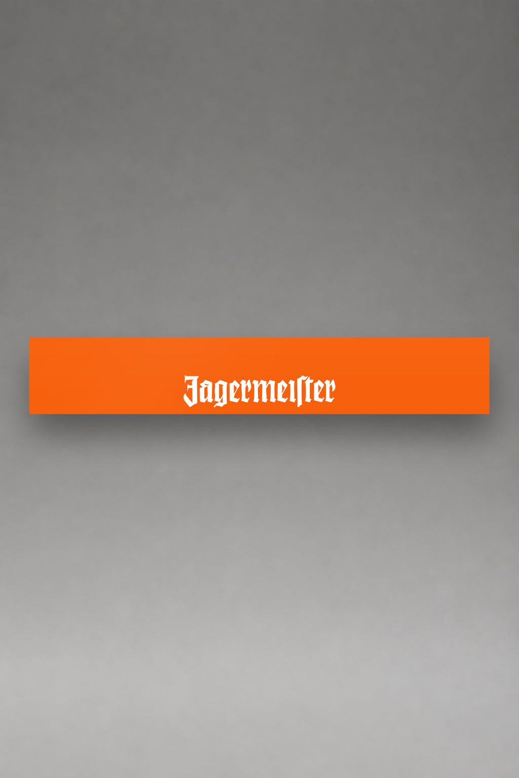 Parasol de vinilo Jägermeister · Naranja de Competición, la tira entera de 150 x 25 cm vista de frente, de MOA-Grafics.