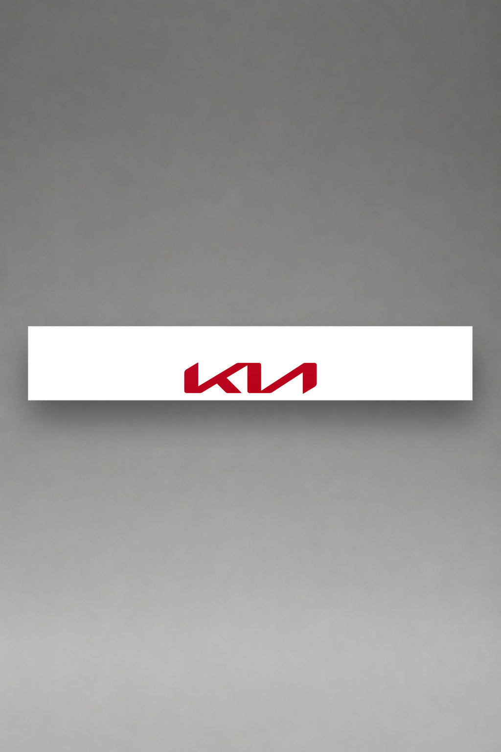 Parasol de vinilo Kia · Logo Moderno Compacto, la tira entera de 150 x 25 cm vista de frente, de MOA-Grafics.