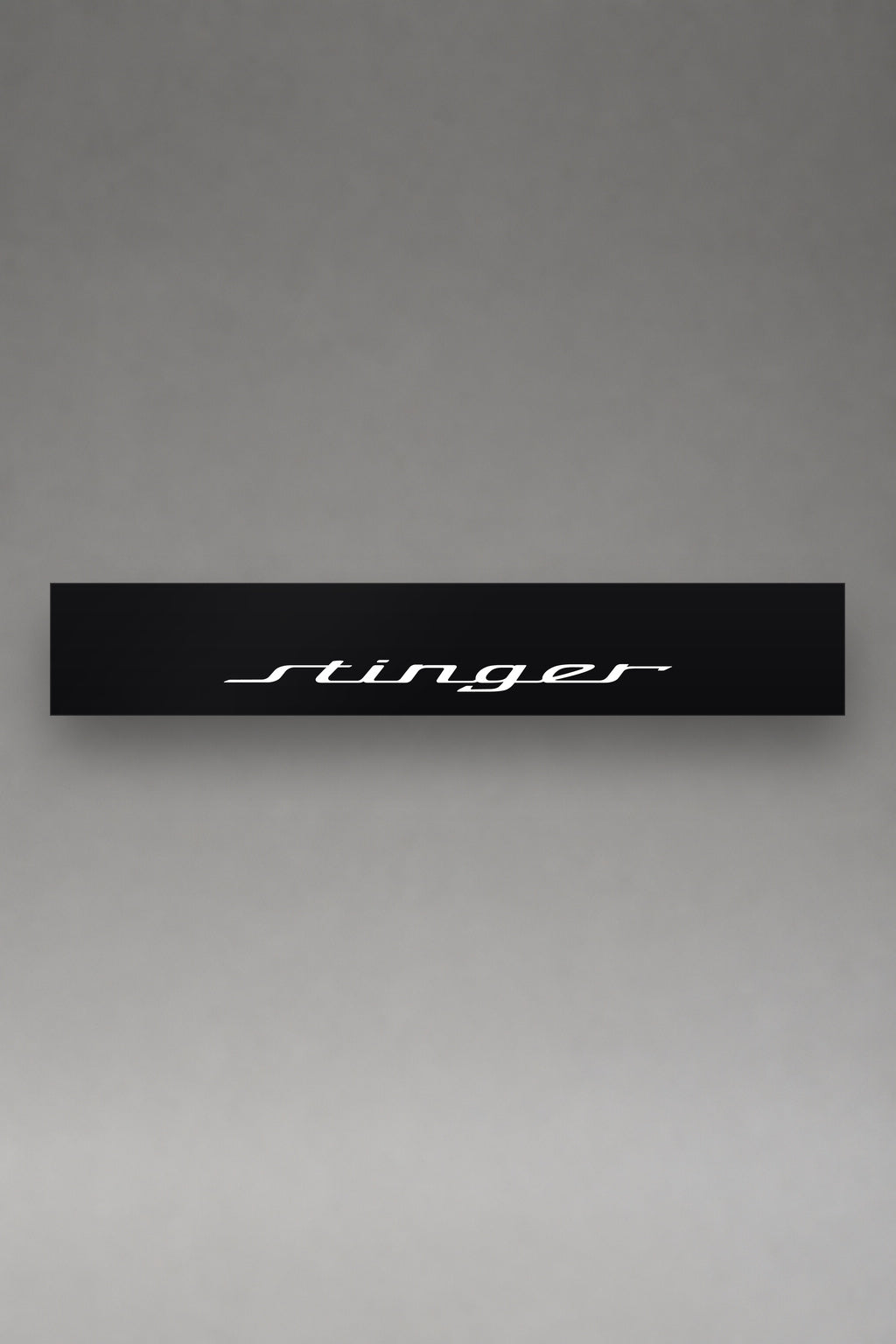 Parasol de vinilo Kia Stinger · Lettering Gran Turismo, la tira entera de 150 x 25 cm vista de frente, de MOA-Grafics.