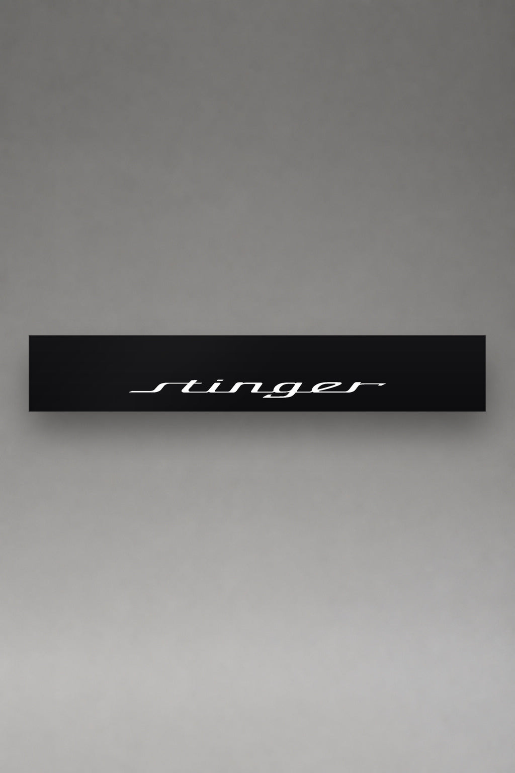 Parasol de vinilo Kia Stinger · Lettering Gran Turismo, la tira entera de 150 x 25 cm vista de frente, de MOA-Grafics.
