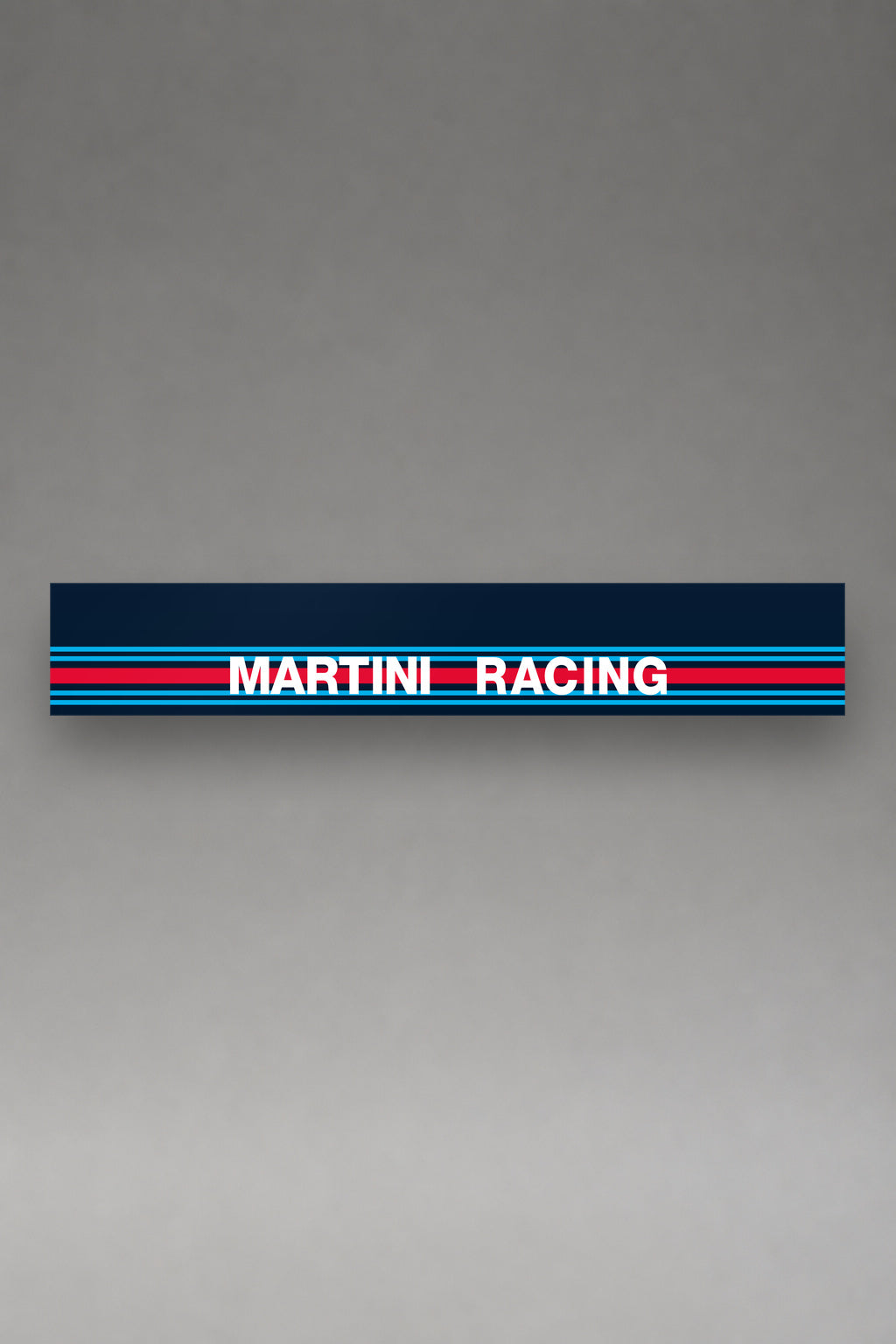 Parasol de vinilo Martini Racing con el lettering y las franjas rectas, la tira entera de 150 x 25 cm vista de frente, de MOA-Grafics.