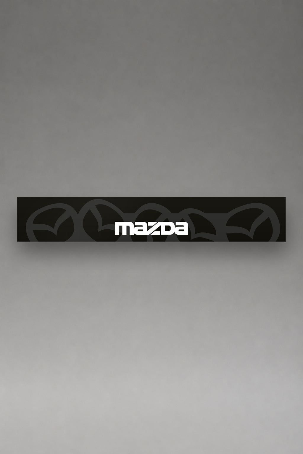Parasol de vinilo Mazda · Patrón Emblema Repetido, la tira entera de 150 x 25 cm vista de frente, de MOA-Grafics.
