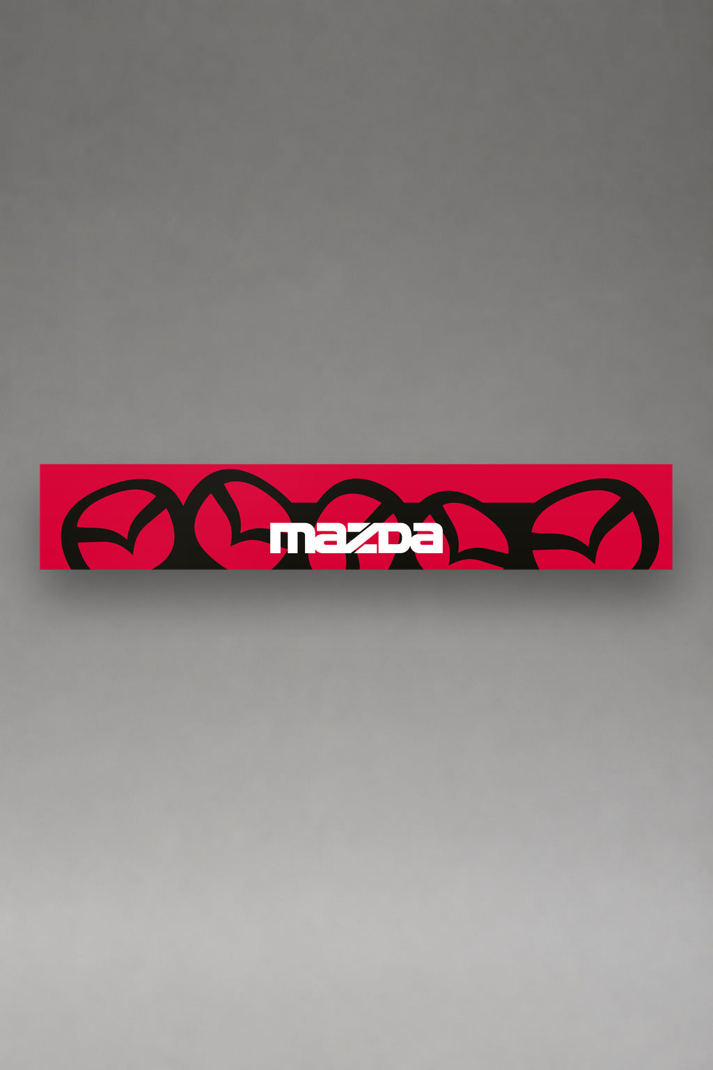 Parasol de vinilo Mazda · Patrón Emblema Repetido, la tira entera de 150 x 25 cm vista de frente, de MOA-Grafics.