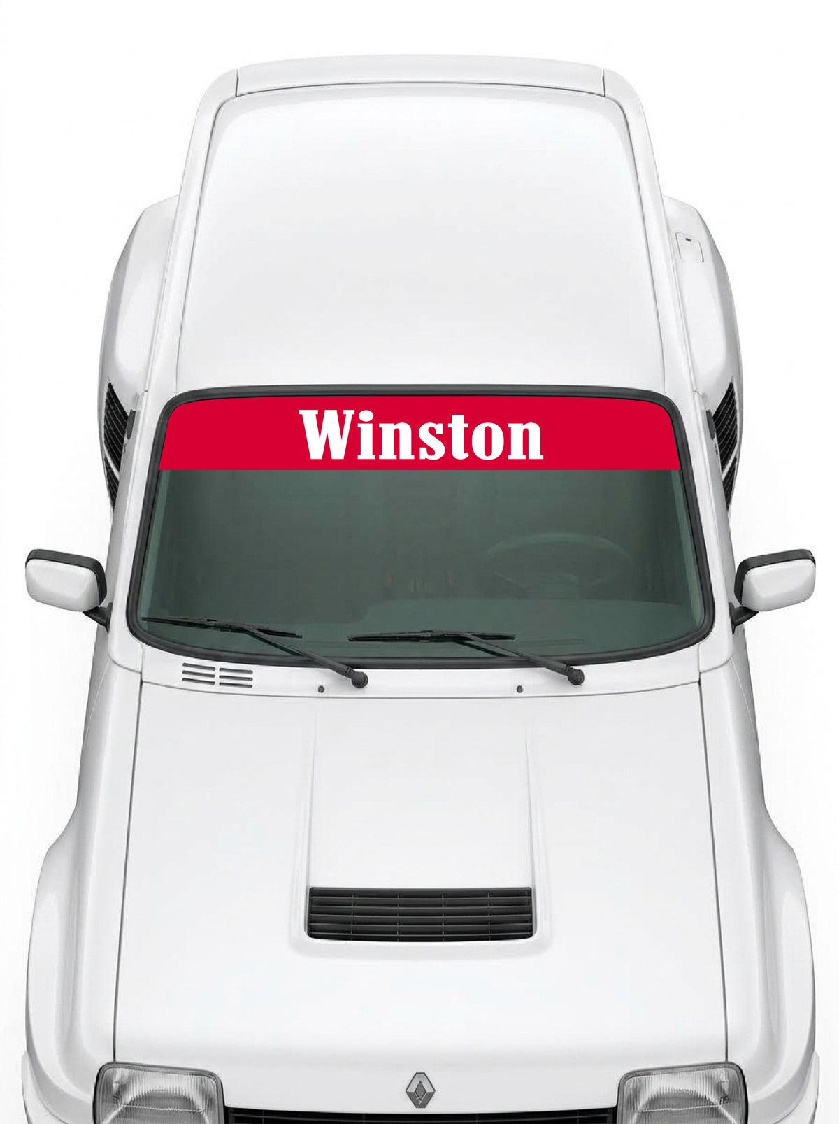 Coche con el parasol de vinilo Winston rojo con el lettering Winston en blanco y tipografia manuscrita instalado en el parabrisas