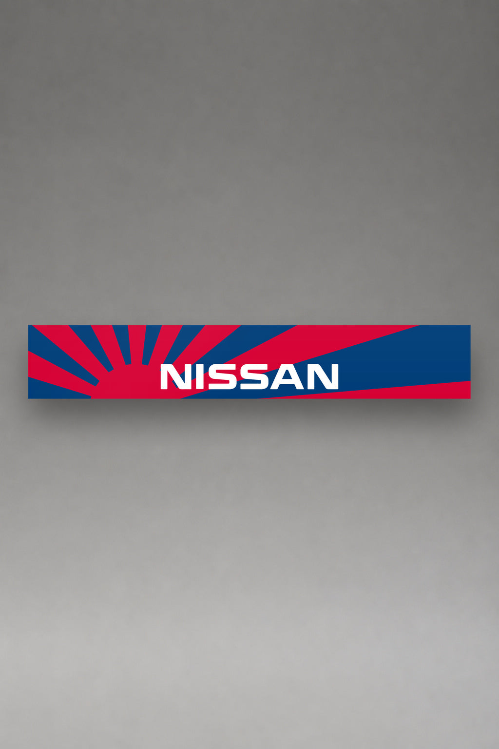 Parasol de vinilo Nissan azul con las lineas de velocidad en rojo, la tira entera vista de frente, de MOA-Grafics.