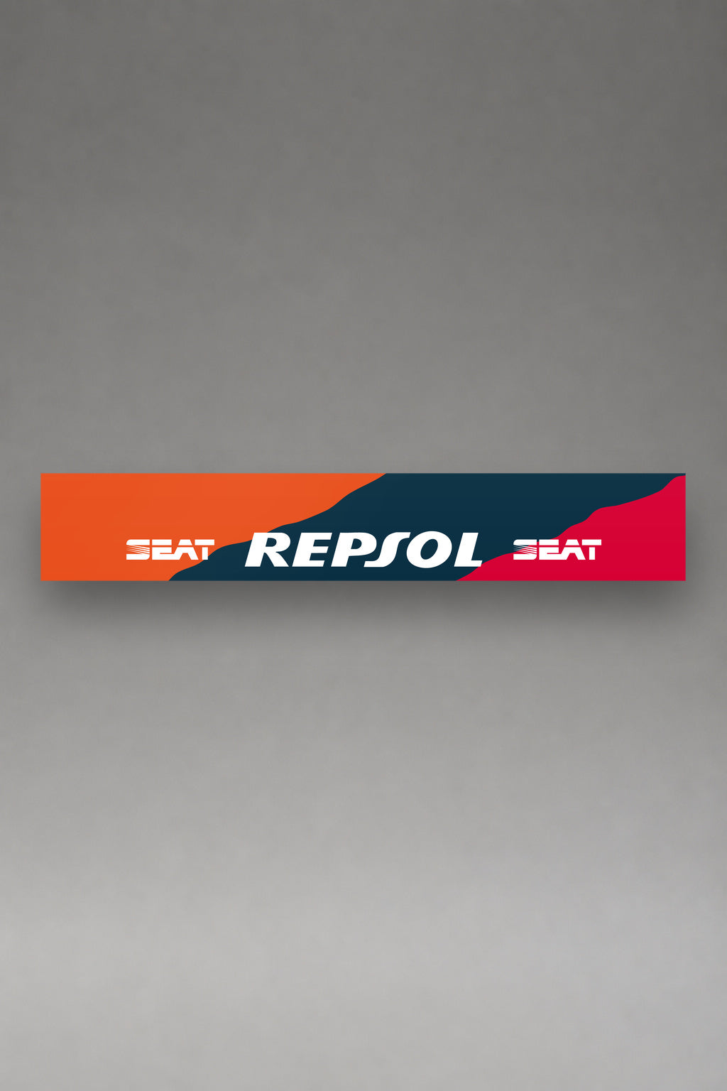 Parasol de vinilo Seat Repsol en naranja, la tira entera de 150 x 25 cm vista de frente, de MOA-Grafics.