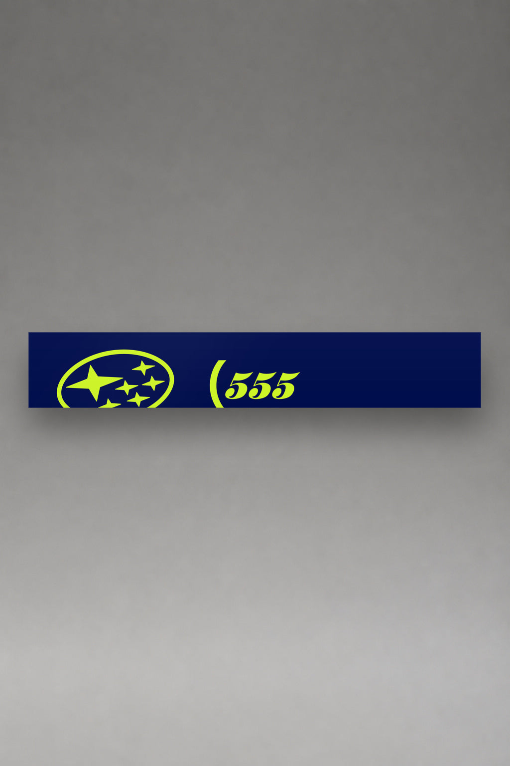 Parasol de vinilo Subaru 555 WRC · Edición Pléyades, la tira entera de 150 x 25 cm vista de frente, de MOA-Grafics.