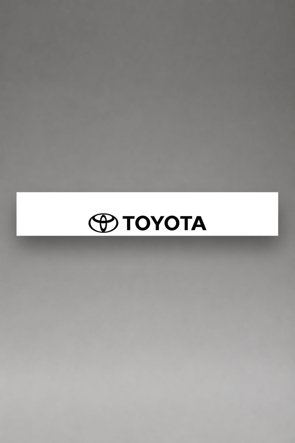 Parasol de vinilo Toyota · Emblema Oficial, la tira entera de 150 x 25 cm vista de frente, de MOA-Grafics.