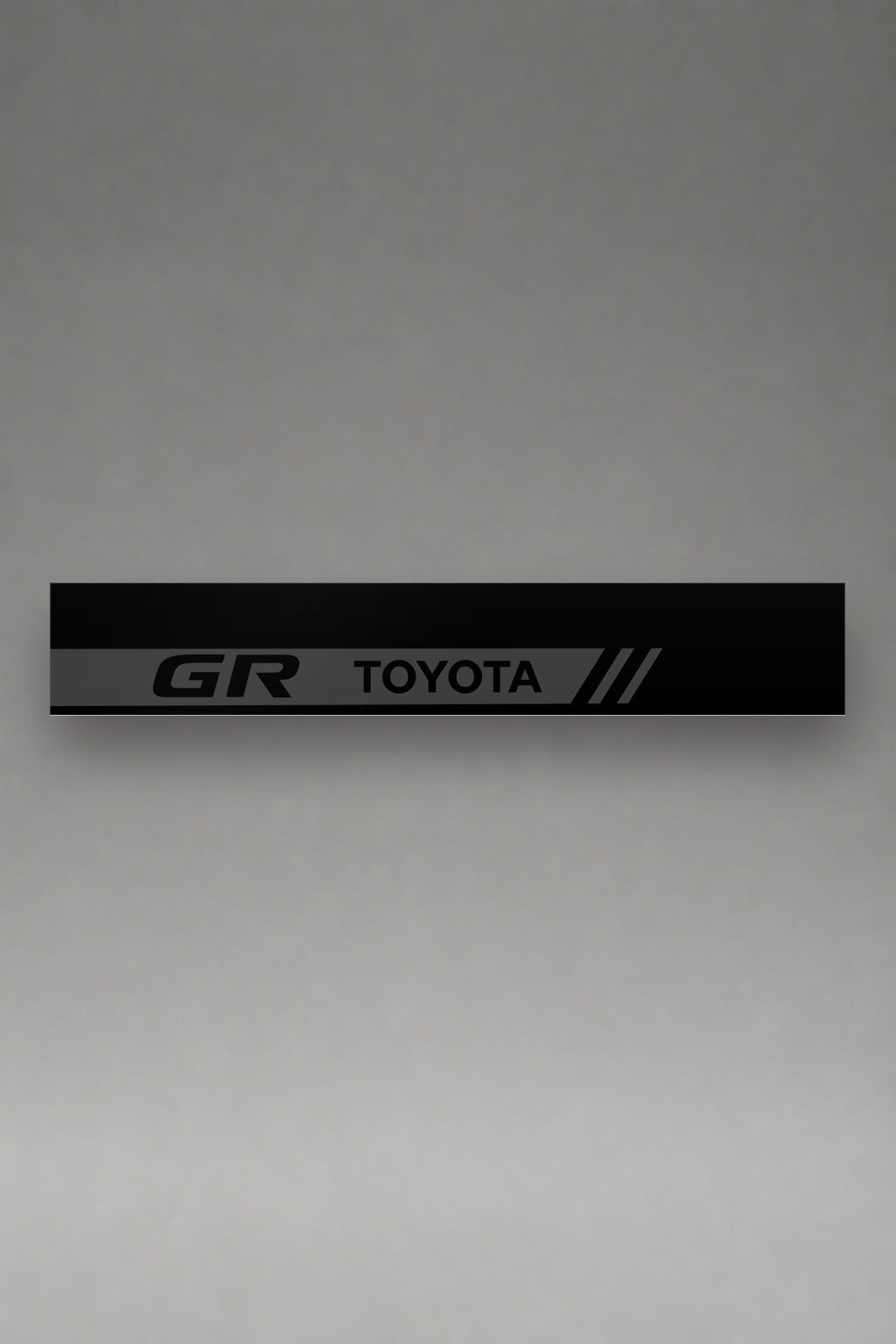 Parasol de vinilo Toyota GR · Logo de las Dos Letras, la tira entera de 150 x 25 cm vista de frente, de MOA-Grafics.