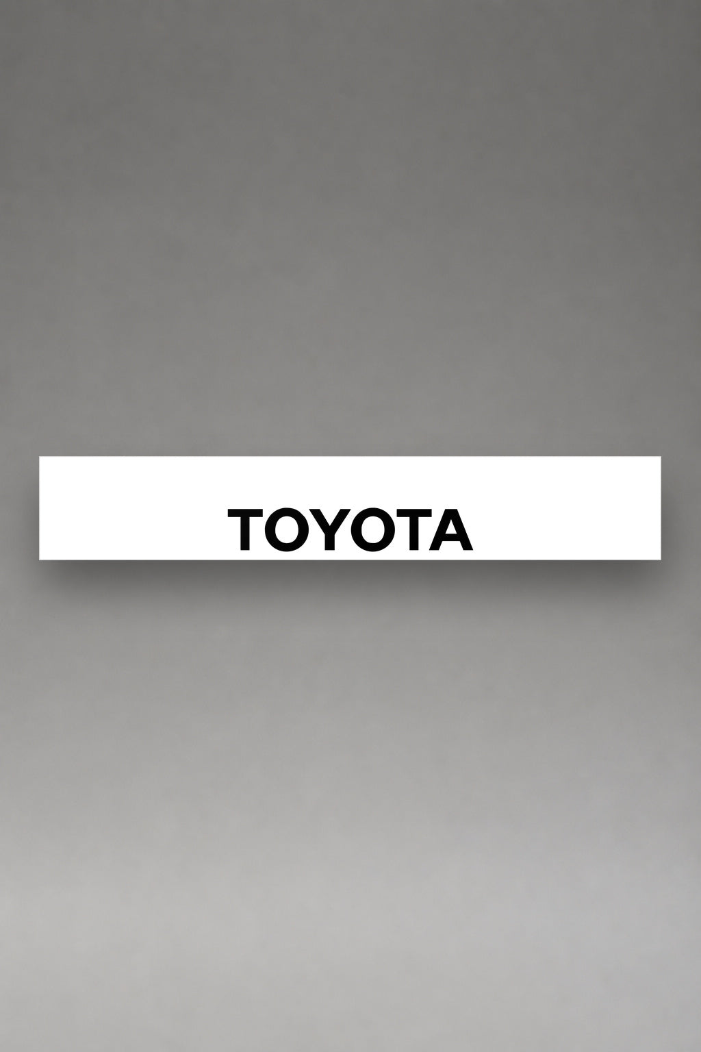 Parasol de vinilo Toyota · Emblema Tres Óvalos, la tira entera de 150 x 25 cm vista de frente, de MOA-Grafics.