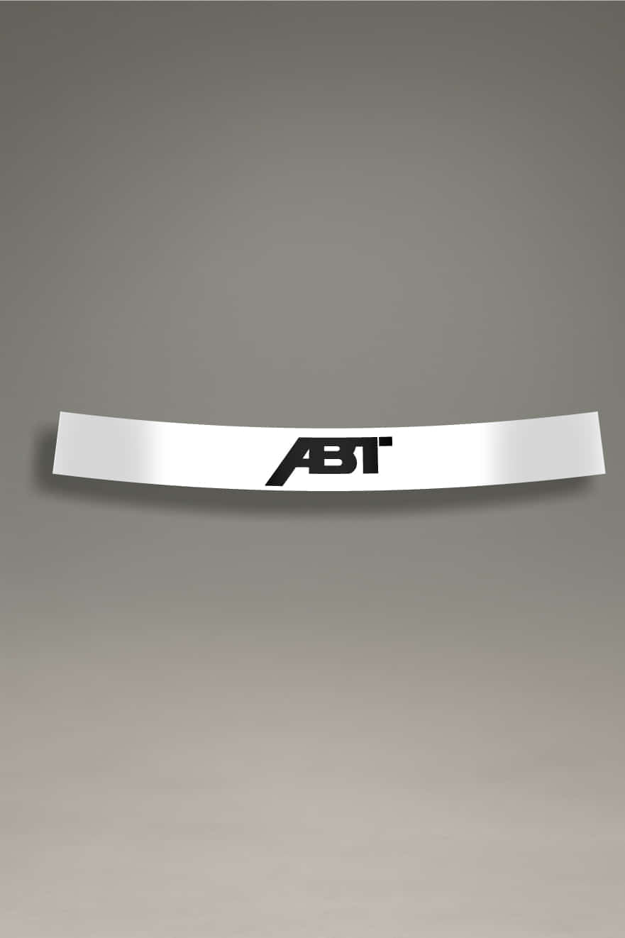 Parasol de vinilo Audi con logo ABT en negro y blanco. Accesorio para parabrisas con protección solar.