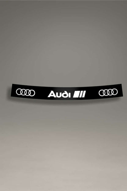  Parasol de vinilo para Audi RS en color negro y blanco con los aros de Audi y el logo de la serie RS. Accesorio esencial para el estilo JDM y la cultura tuning.