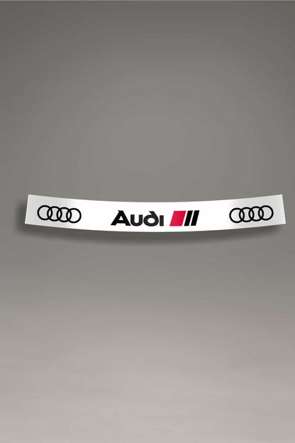 Parasol de vinilo para Audi RS en color blanco y negro con el logo de Audi y la insignia RS. Accesorio de tuning y estilo racing para parabrisas.