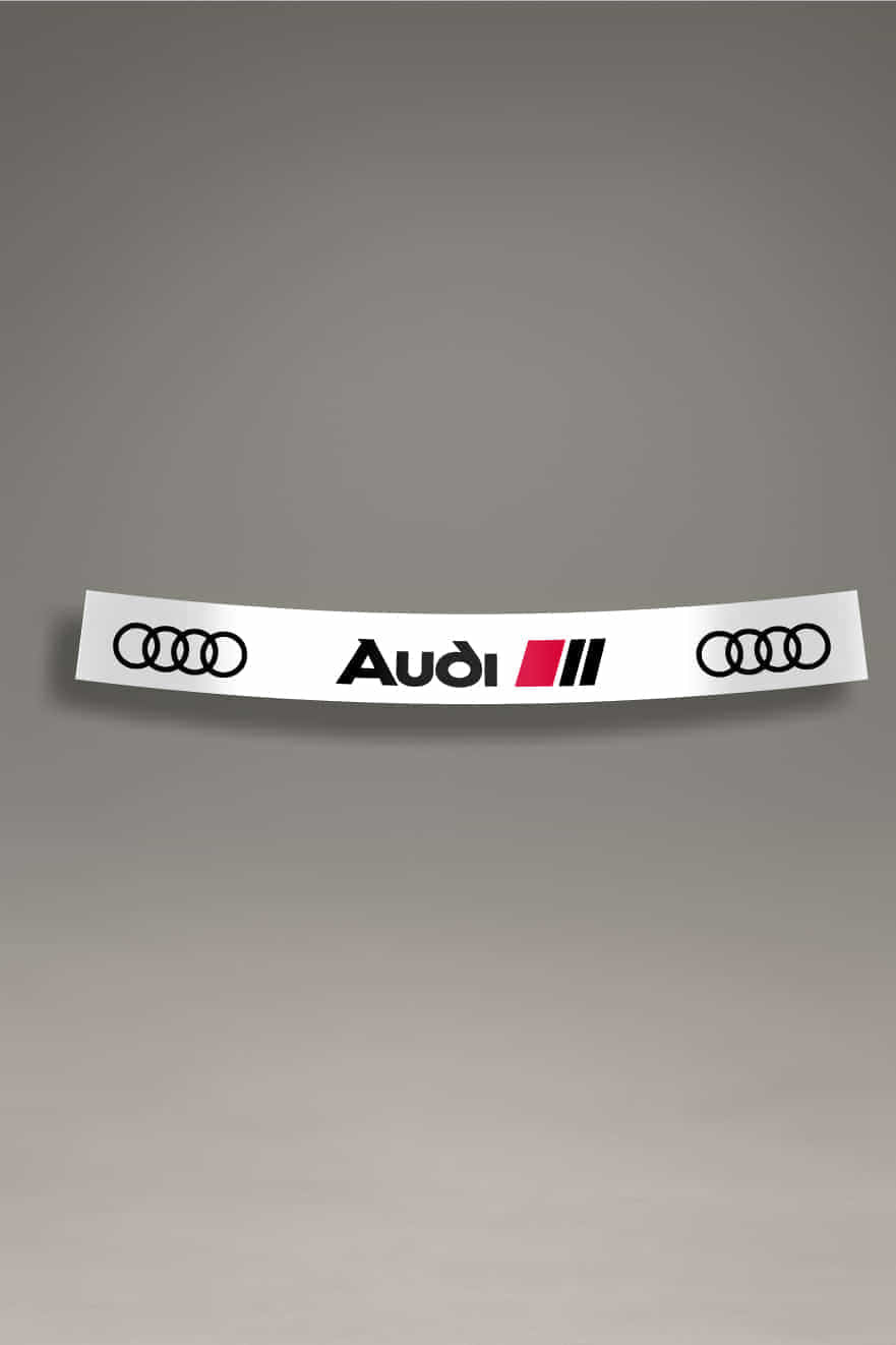 Parasol de vinilo para Audi RS en color blanco y negro con el logo de Audi y la insignia RS. Accesorio de tuning y estilo racing para parabrisas.