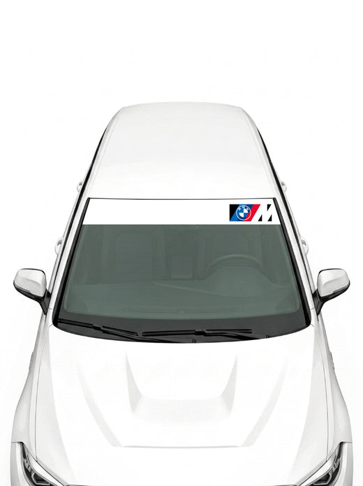 Parasol de vinilo BMW M blanco con el emblema BMW y el logo M en la esquina derecha, instalado en el parabrisas de un coche blanco