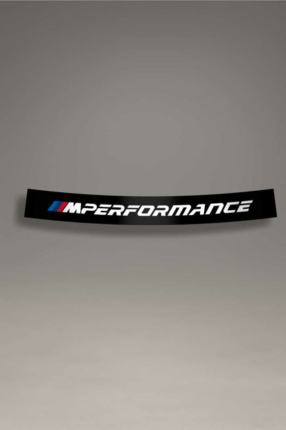 Parasol BMW M Performance en color negro con el logotipo de BMW M y la palabra "PERFORMANCE" en blanco. Ideal para darle un toque deportivo y de alto rendimiento a los vehículos BMW con un diseño elegante y moderno.