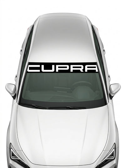 Coche con el parasol de vinilo Cupra negro con el lettering CUPRA en blanco a todo lo ancho instalado en el parabrisas