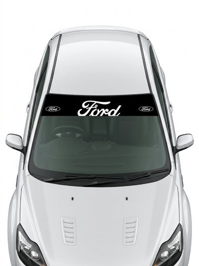 Parasol de vinilo Ford negro con el lettering Ford en blanco y un ovalo a cada lado, instalado en el parabrisas de un Ford blanco
