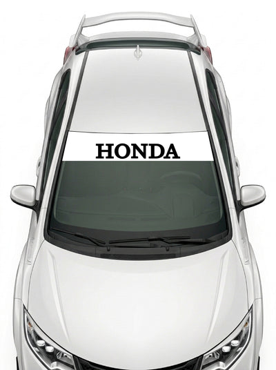 Parasol de vinilo Honda blanco con el lettering HONDA en negro, instalado en el parabrisas de un Honda Civic blanco