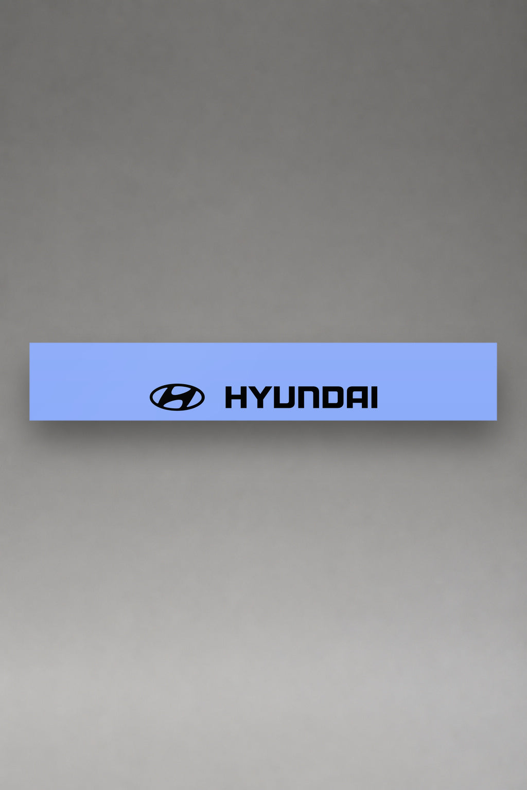 Parasol de vinilo Hyundai · Emblema Oval Oficial, la tira entera de 150 x 25 cm vista de frente, de MOA-Grafics.