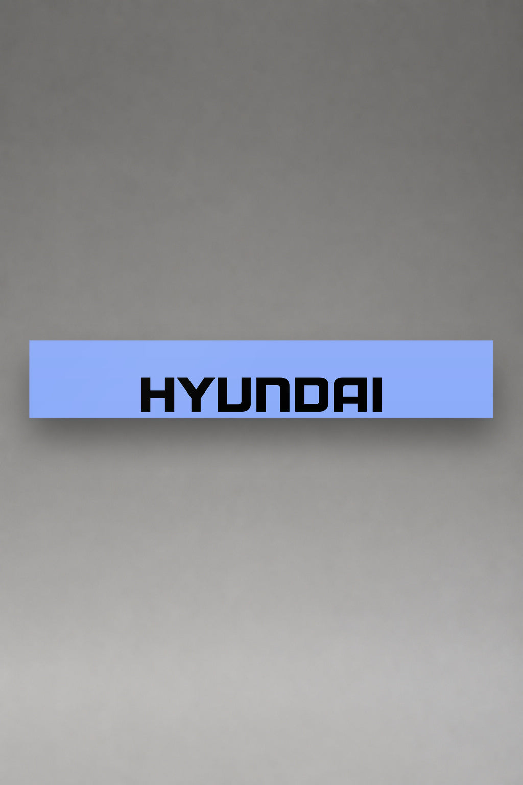 Parasol de vinilo Hyundai · Lettering Moderno Tipográfico, la tira entera de 150 x 25 cm vista de frente, de MOA-Grafics.