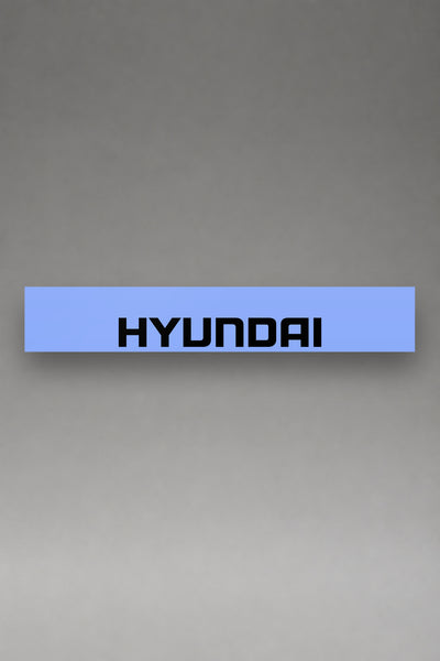 Parasol de vinilo Hyundai · Lettering Moderno Tipográfico, la tira entera de 150 x 25 cm vista de frente, de MOA-Grafics.