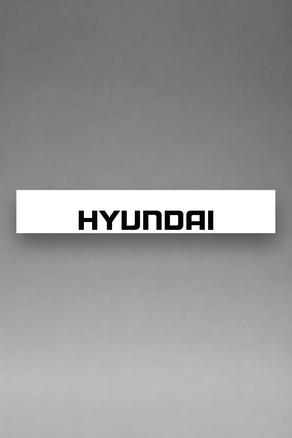 Parasol de vinilo Hyundai · Lettering Moderno Tipográfico, la tira entera de 150 x 25 cm vista de frente, de MOA-Grafics.