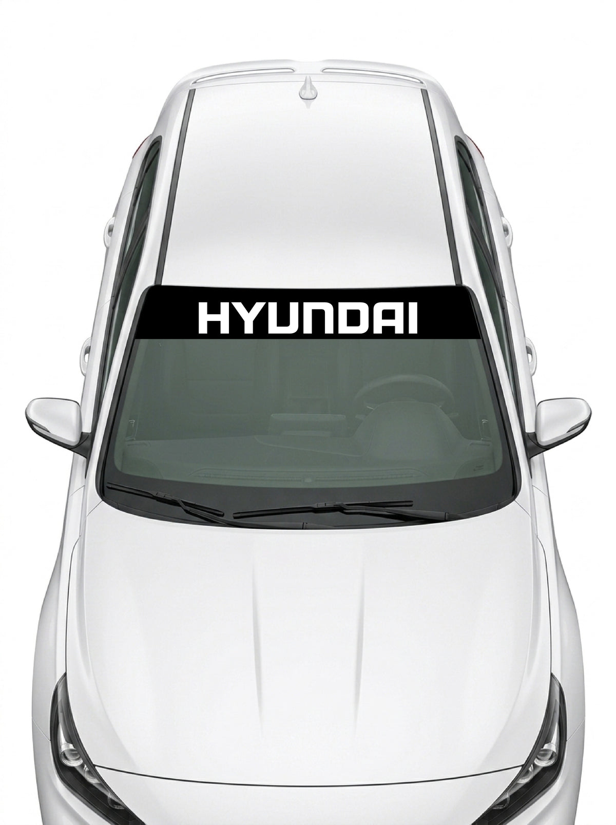 Parasol de vinilo Hyundai negro con el lettering HYUNDAI en blanco, instalado en el parabrisas de un Hyundai blanco