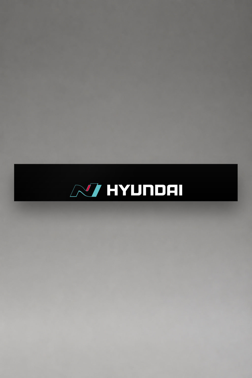 Parasol de vinilo Hyundai N Performance · Logo N y Lettering Dual, la tira entera de 150 x 25 cm vista de frente, de MOA-Grafics.