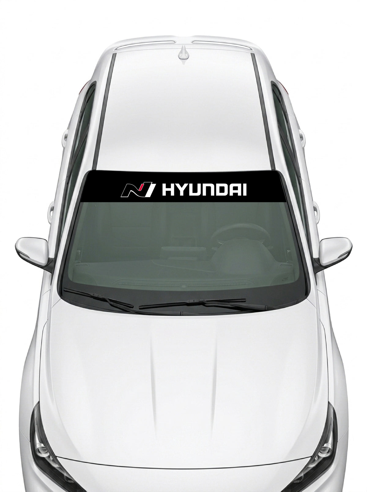 Parasol de vinilo Hyundai N negro con el logo N en rojo y el lettering HYUNDAI en blanco, instalado en el parabrisas de un Hyundai blanco