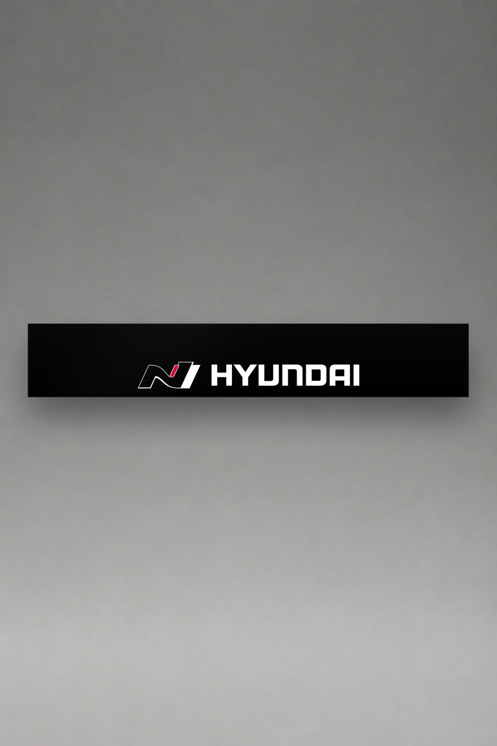 Parasol de vinilo Hyundai N Performance · Logo N y Lettering Dual, la tira entera de 150 x 25 cm vista de frente, de MOA-Grafics.