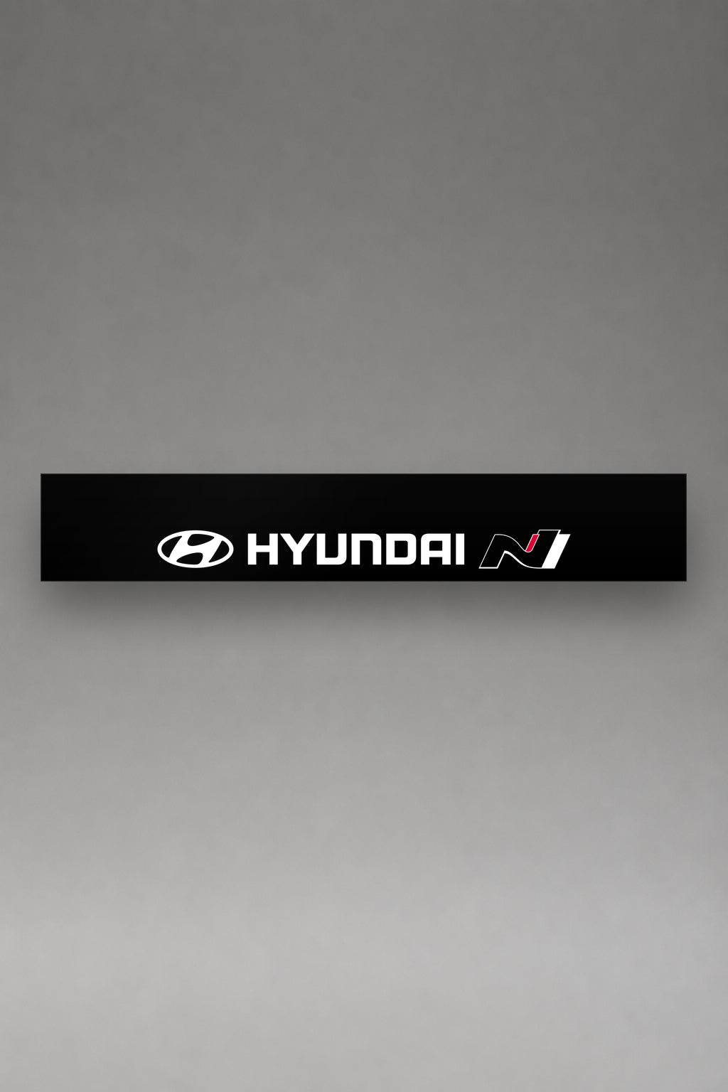 Parasol de vinilo Hyundai N Performance · Composición Triple H N, la tira entera de 150 x 25 cm vista de frente, de MOA-Grafics.