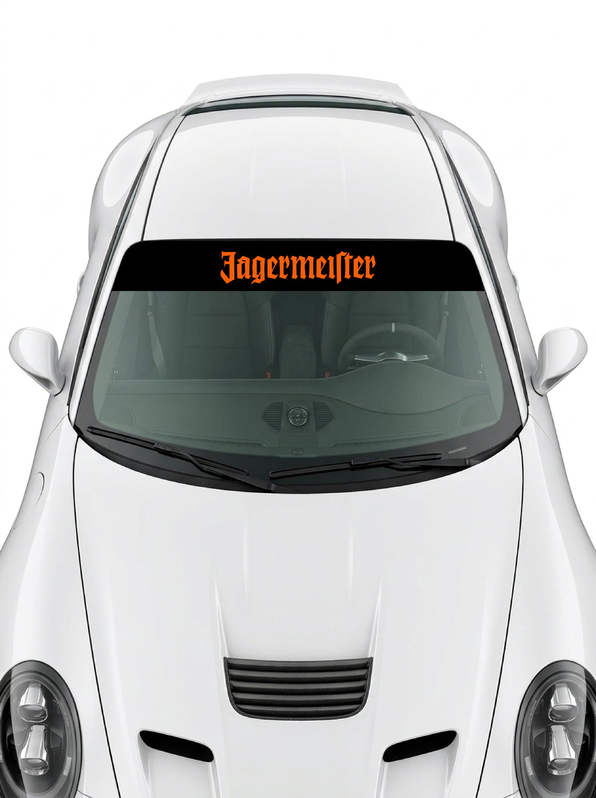 Coche con el parasol de vinilo Jagermeister negro con el lettering Jagermeister en naranja instalado en el parabrisas