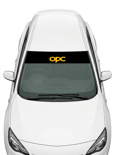 Coche con el parasol de vinilo Opel OPC negro con el lettering OPC en amarillo instalado en el parabrisas