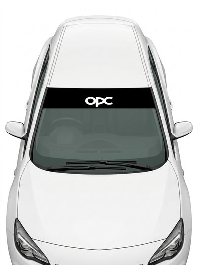 Coche con el parasol de vinilo Opel OPC negro con el lettering OPC en blanco instalado en el parabrisas