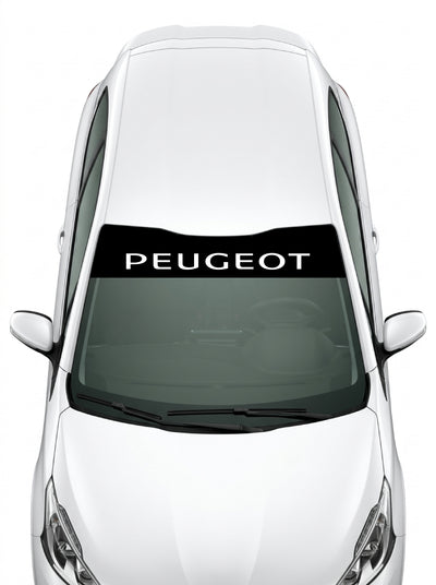 Coche con el parasol de vinilo Peugeot negro con el lettering PEUGEOT en mayusculas en blanco instalado en el parabrisas