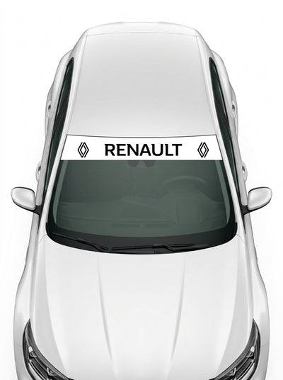 Coche con el parasol de vinilo Renault blanco con el rombo de 2021 a los dos lados y el lettering RENAULT en negro instalado en el parabrisas