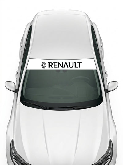 Coche con el parasol de vinilo Renault blanco con el rombo de 2021 y el lettering RENAULT en negro instalado en el parabrisas