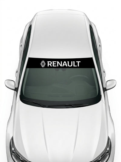 Coche con el parasol de vinilo Renault negro con el rombo de 2021 y el lettering RENAULT en blanco instalado en el parabrisas