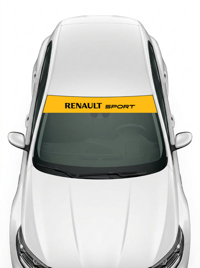 Coche con el parasol de vinilo Renault Sport amarillo con el lettering RENAULT SPORT en negro instalado en el parabrisas