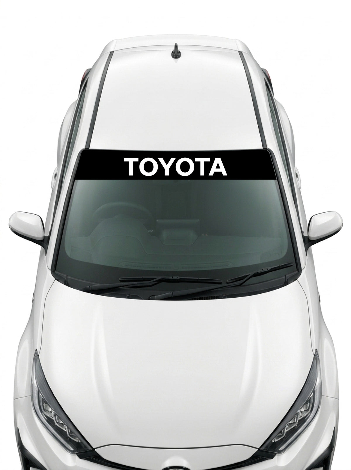 Coche con el parasol de vinilo Toyota negro con el lettering TOYOTA en blanco instalado en el parabrisas