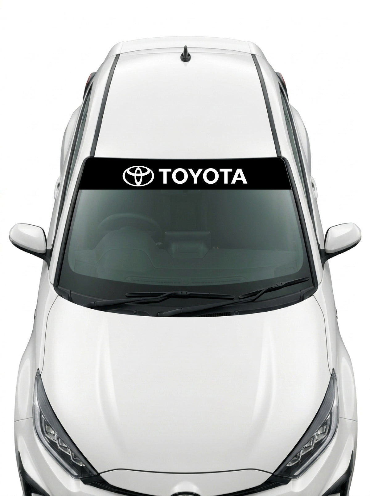 Coche con el parasol de vinilo Toyota negro con el emblema de los tres ovalos y el lettering TOYOTA en blanco instalado en el parabrisas
