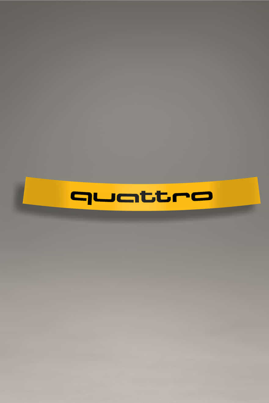 Parasol de vinilo amarillo para Audi Quattro con el logo en negro. Ideal para dar un toque de color y estilo tuning a tu coche.