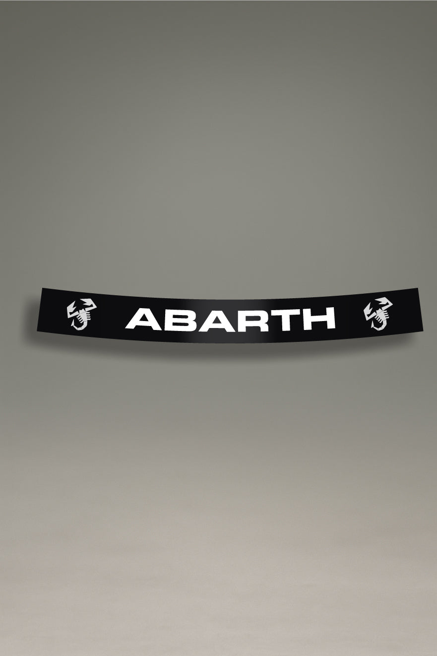 Parasol de vinilo negro con el logo del escorpión y el texto 'Abarth' en blanco. Accesorio deportivo de MOA-Grafics para proteger y personalizar el parabrisas de vehículos Fiat.