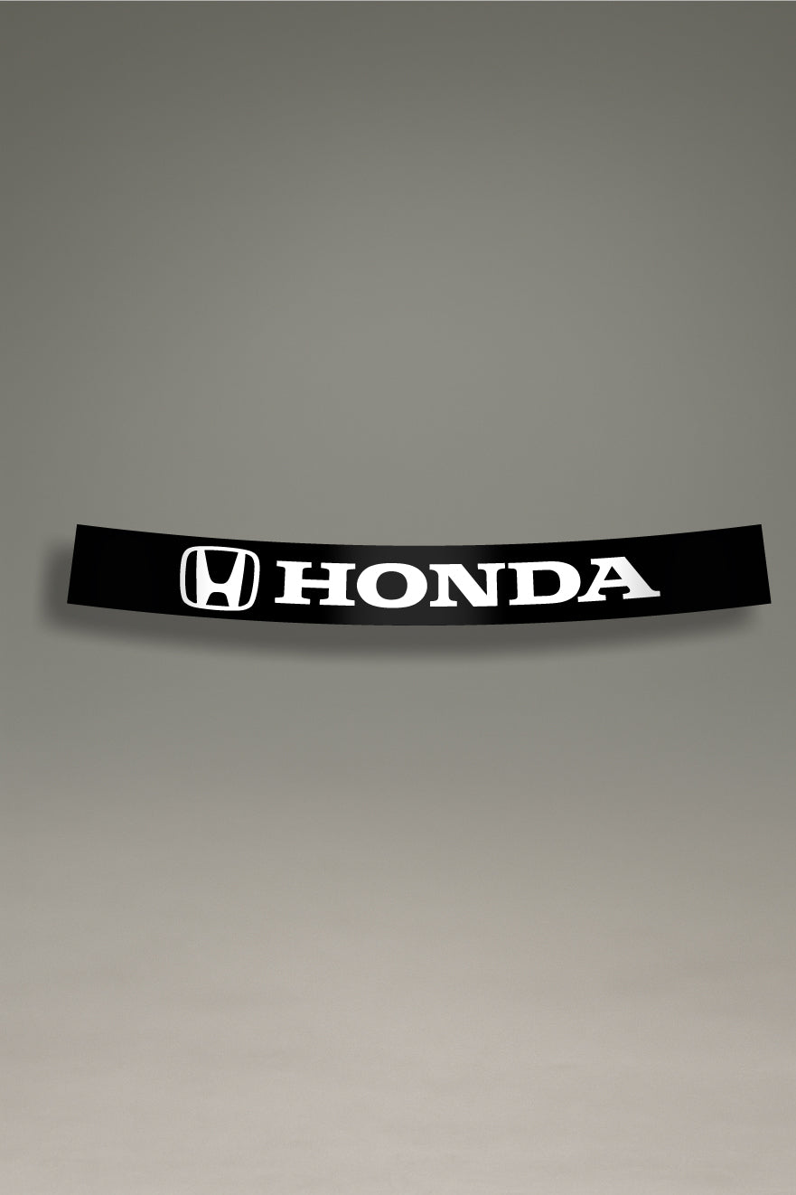 Parasol de vinilo negro con el logotipo oficial de Honda en blanco. Accesorio de MOA-Grafics para personalizar el coche con un estilo JDM y proteger el interior.